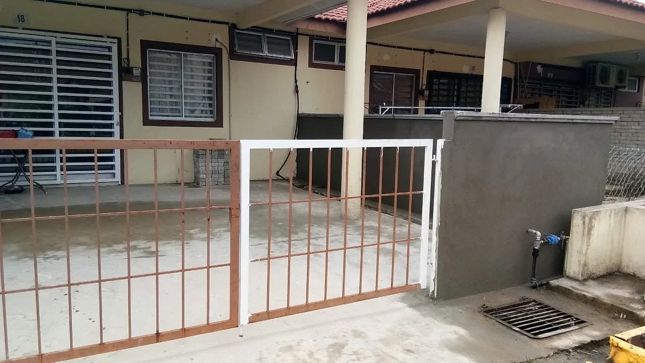 Front gate refitted against the new fence wall