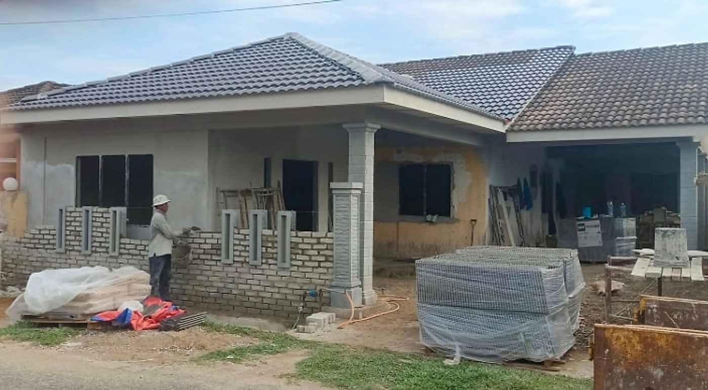 New porch columns and front fence wall going up