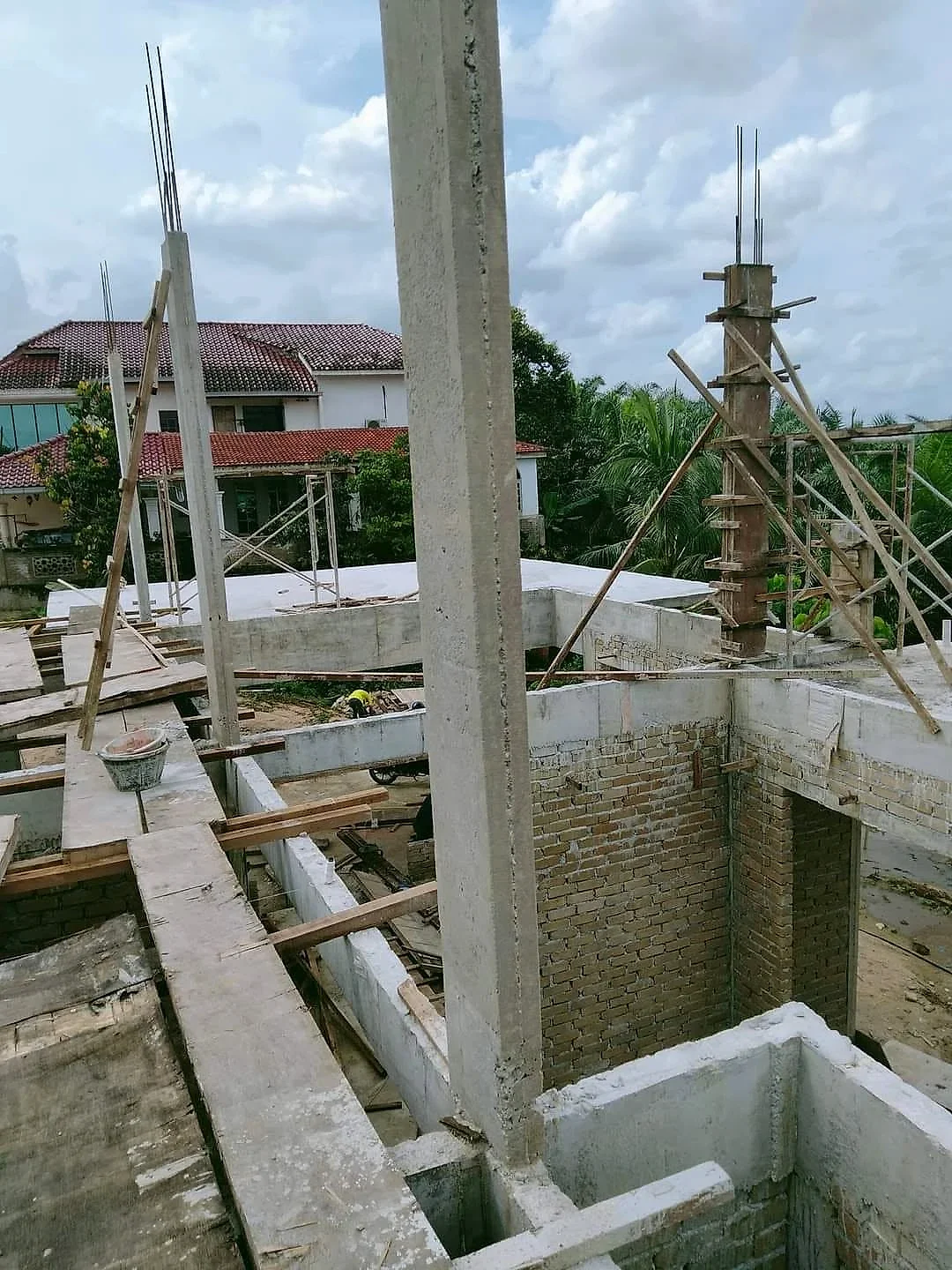 Concrete columns and beams cast for an upper-floor extension