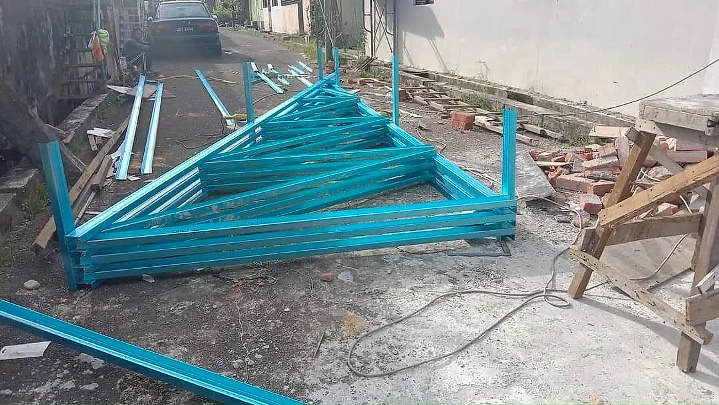 Light steel roof trusses stacked on site ready to lift