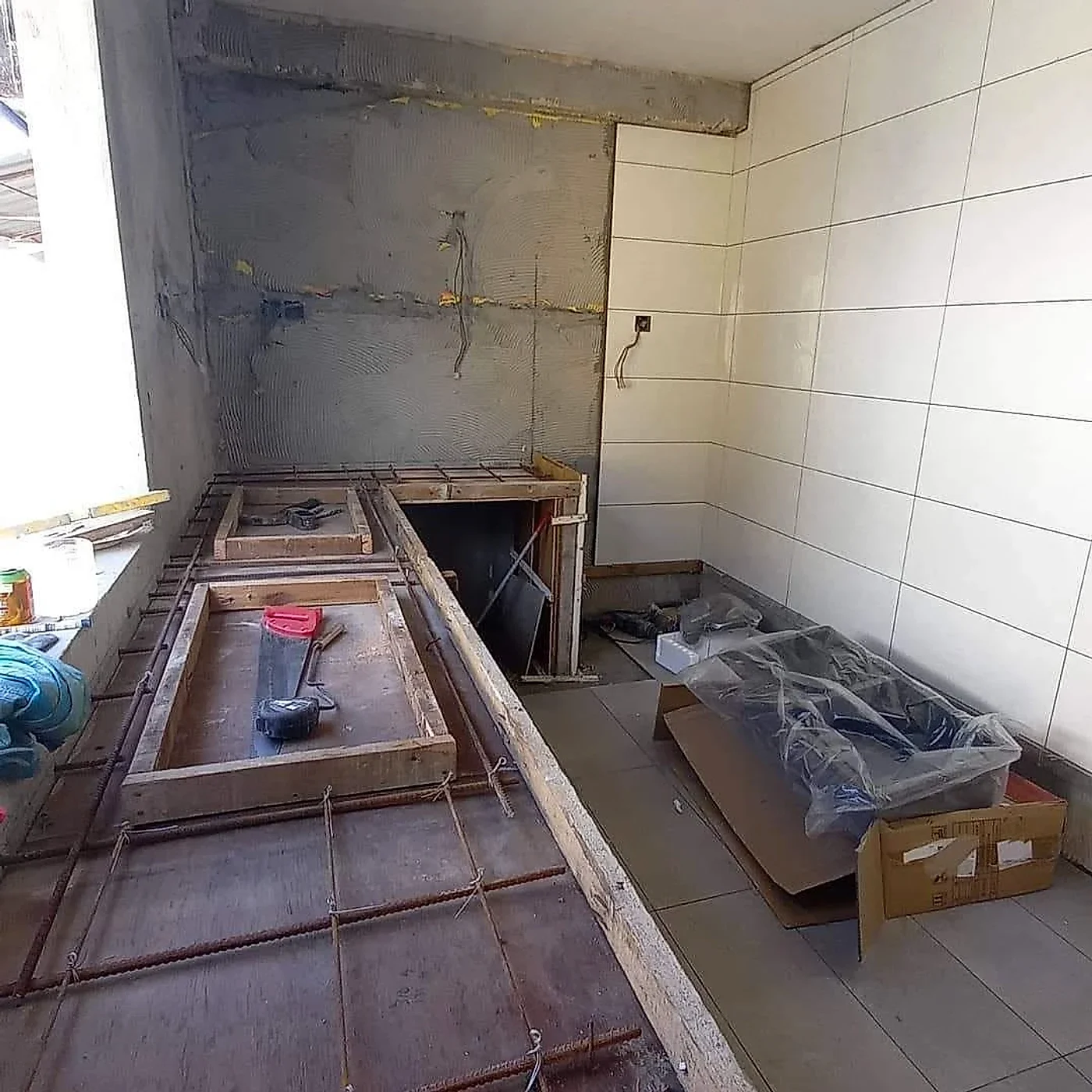 Timber formwork and steel bars set up for a new concrete kitchen counter