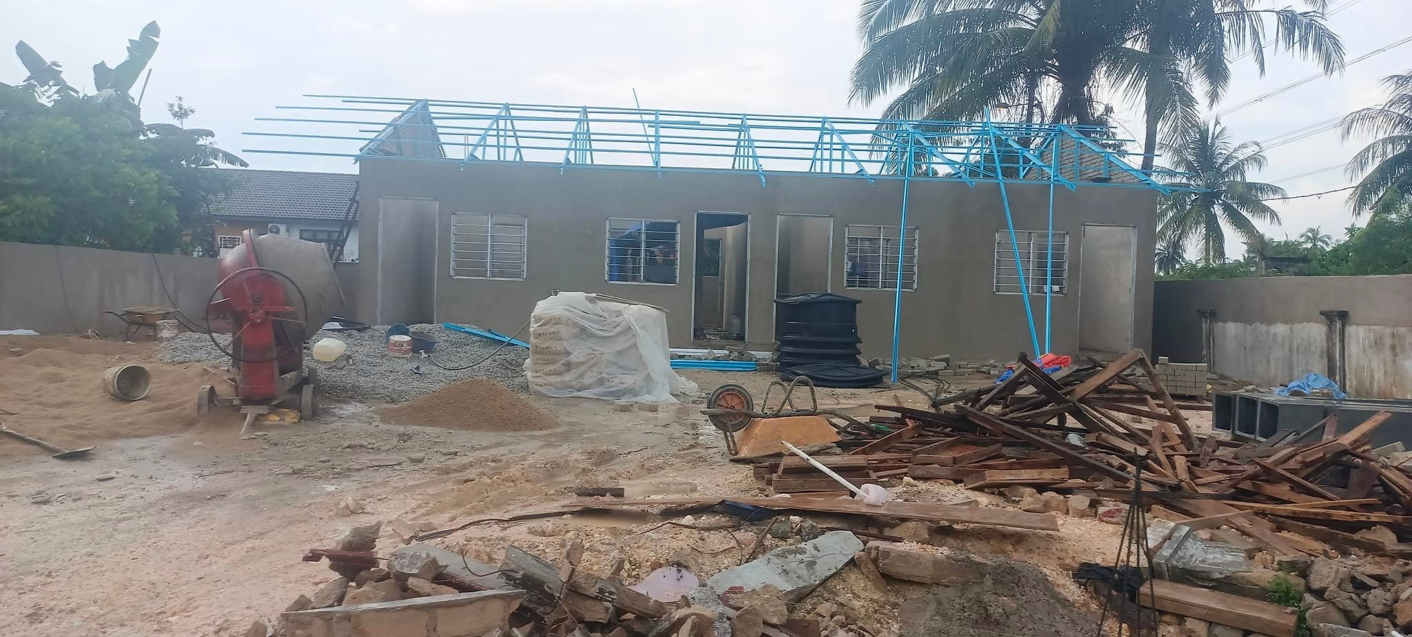 Plastered walls with light steel roof trusses going up