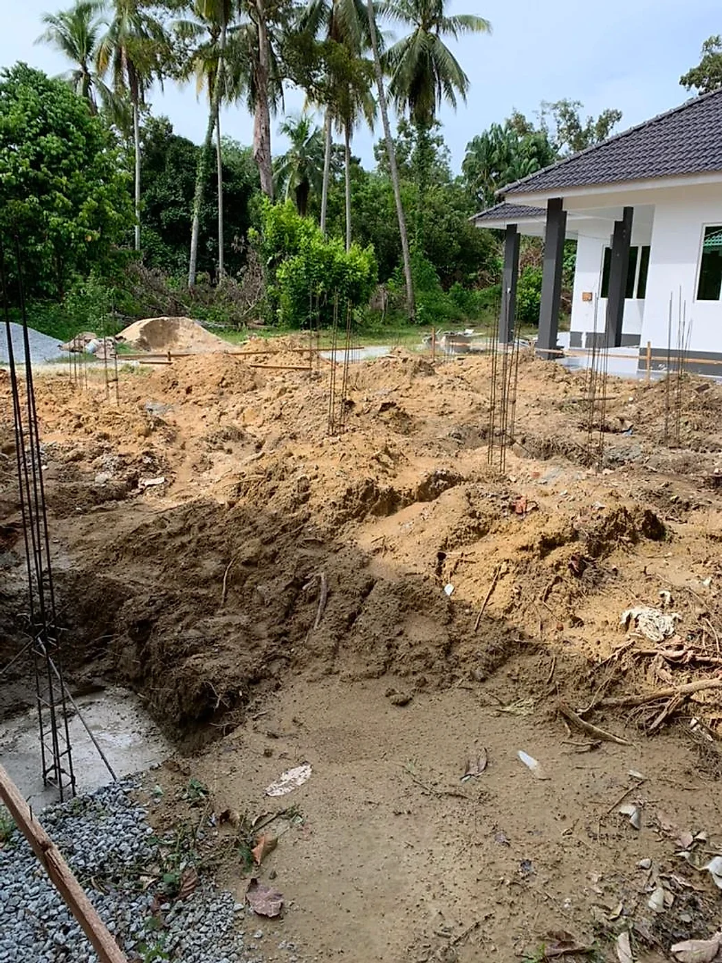 Footing pits beside the main house