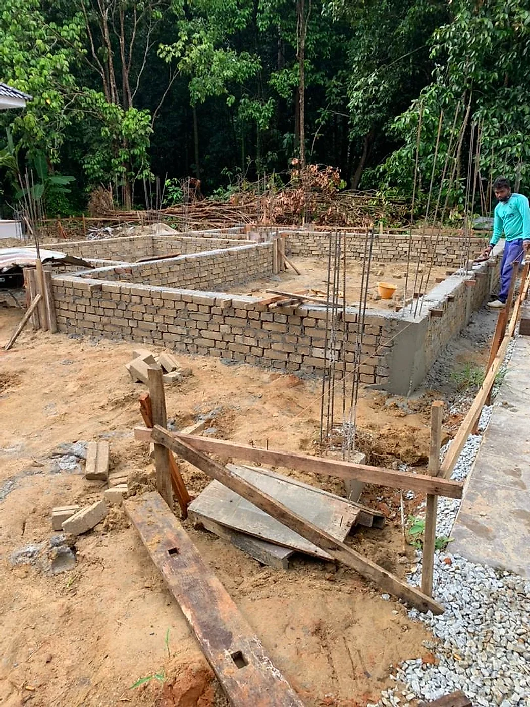 Brick ground beams laid out with column starter bars