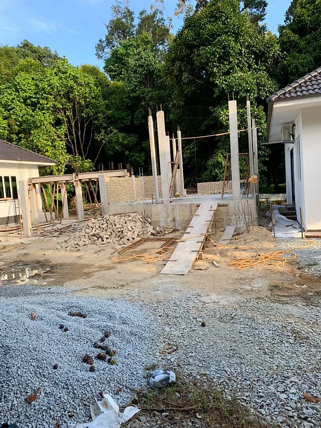 Columns cast, brick walls rising