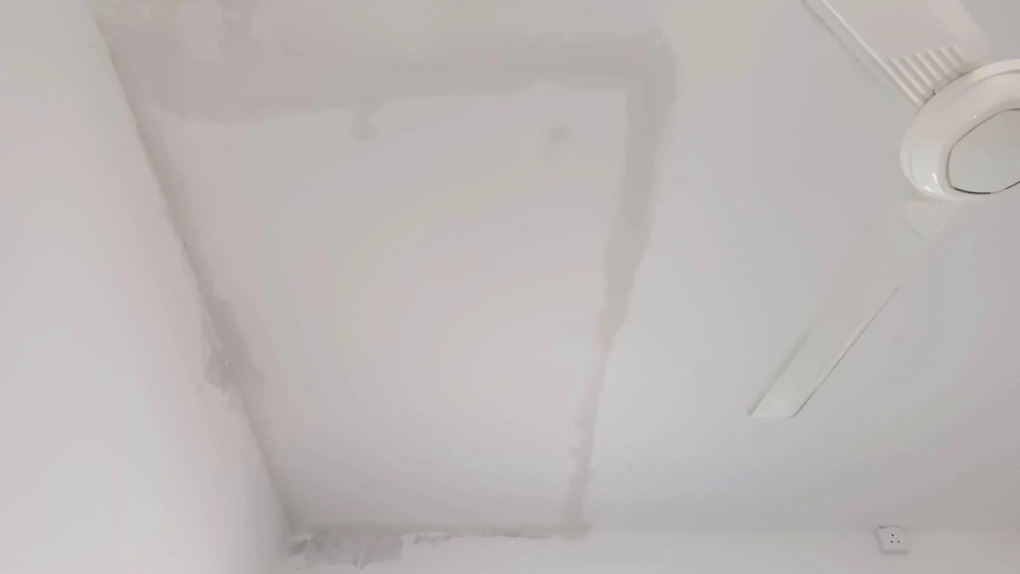 Ceiling repaired and repainted after the leak was fixed